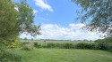 Blick in den Garten und die umliegende Landschaft